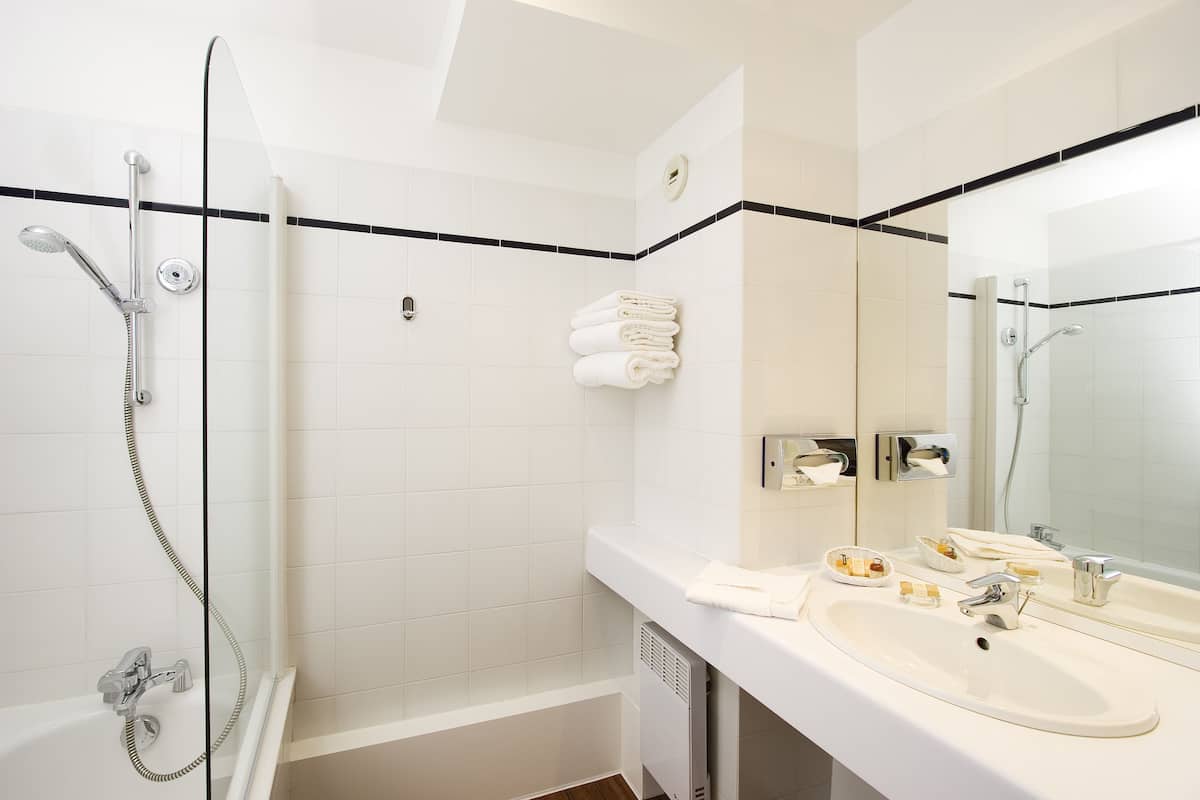 eco-friendly toiletries, hair dryer, towels