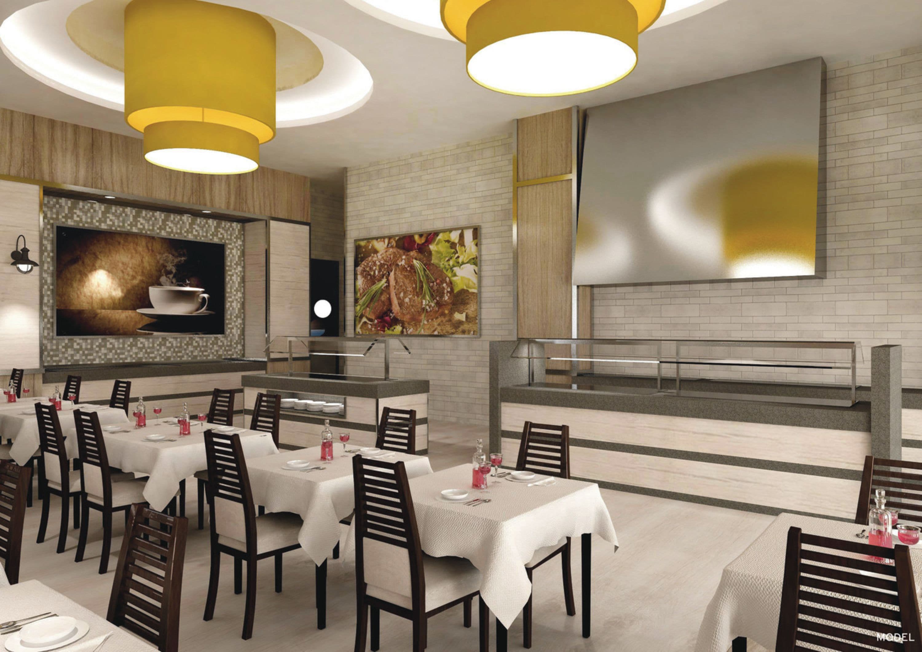 A modern restaurant with multiple dining tables, yellow pendant lights, and a large mural on the wall.