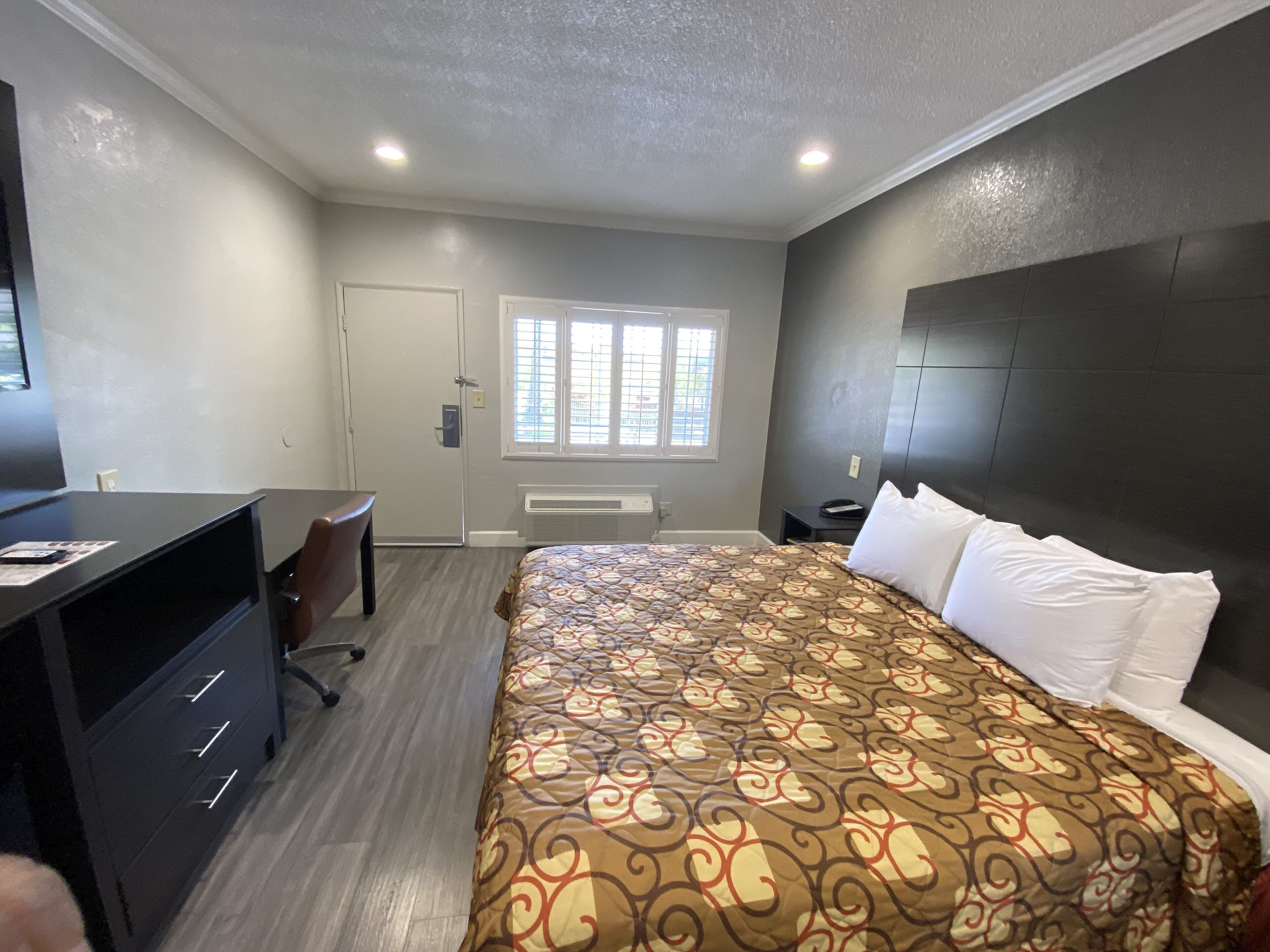 Premium bedding, pillowtop beds, desk, blackout drapes