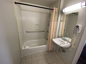 Comfort Room, 1 King Bed, Non Smoking | Bathroom | Combined shower/tub, hair dryer, towels