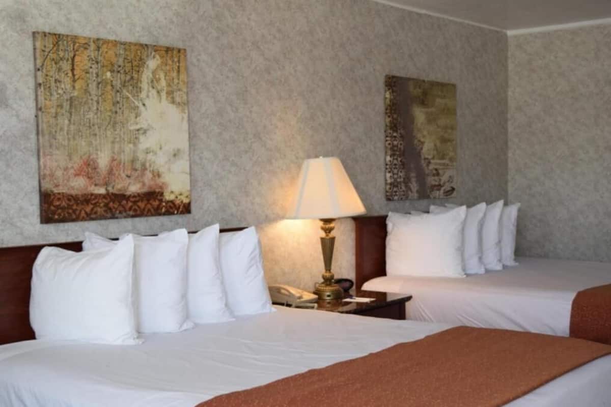 Desk, laptop workspace, iron/ironing board, cots/infant beds