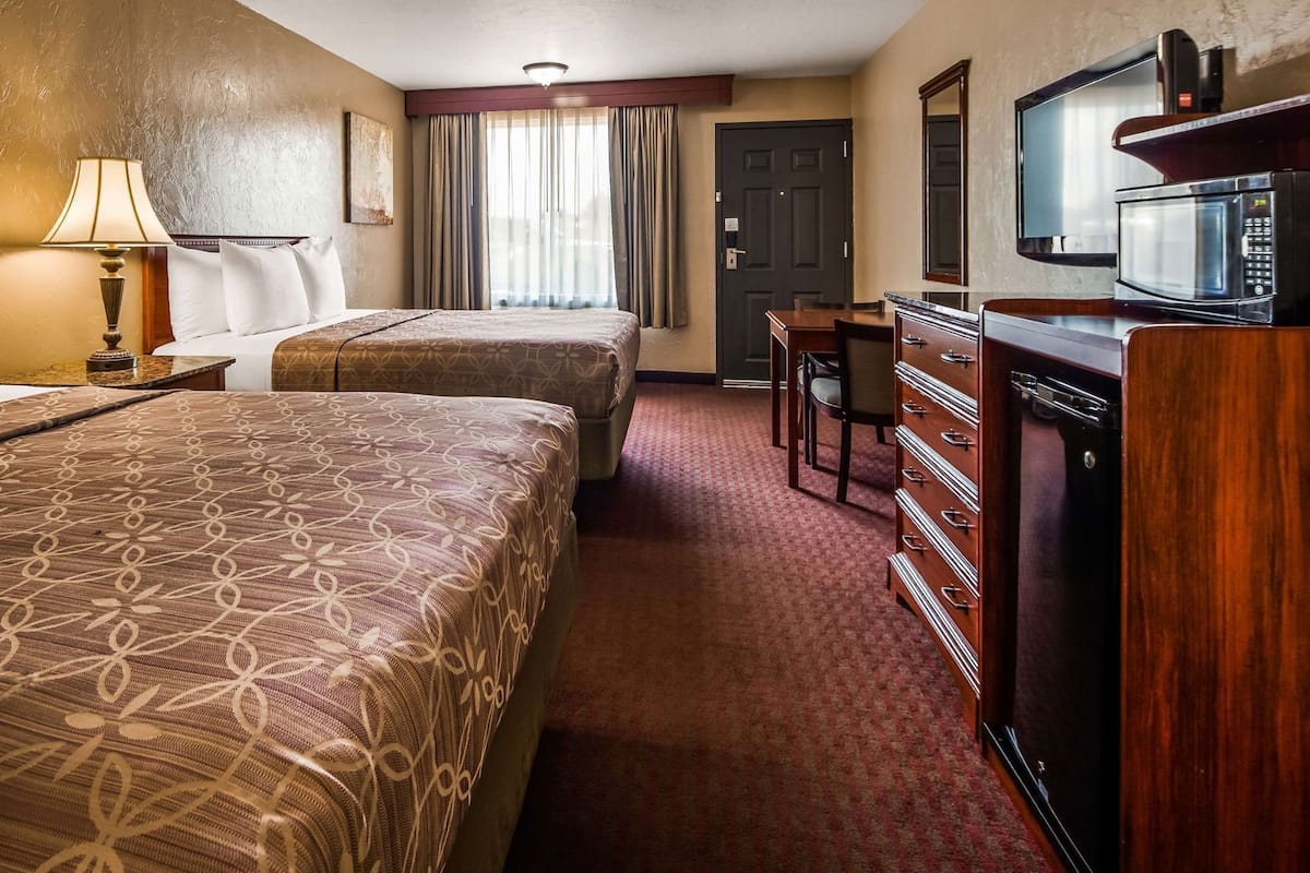 Desk, laptop workspace, iron/ironing board, cots/infant beds