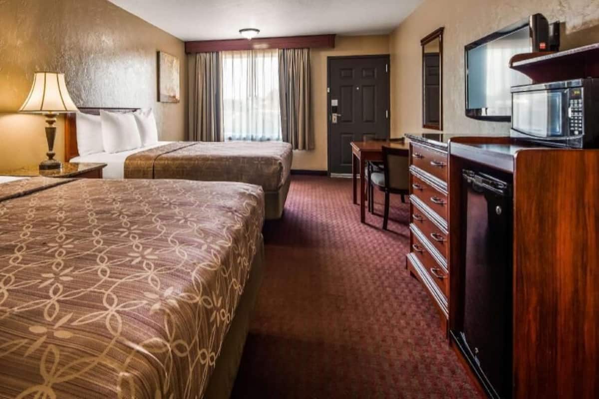 Desk, laptop workspace, iron/ironing board, cots/infant beds