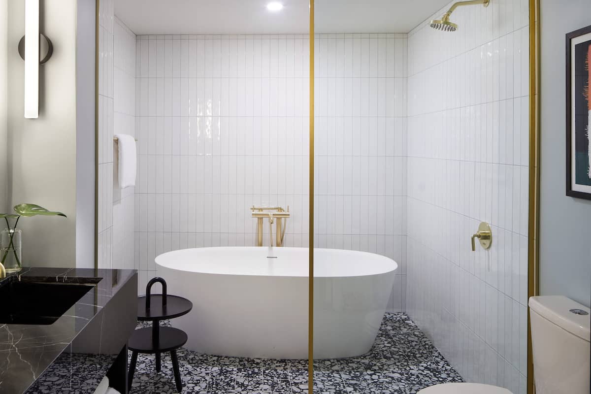 rainfall showerhead, designer toiletries, hair dryer, bathrobes