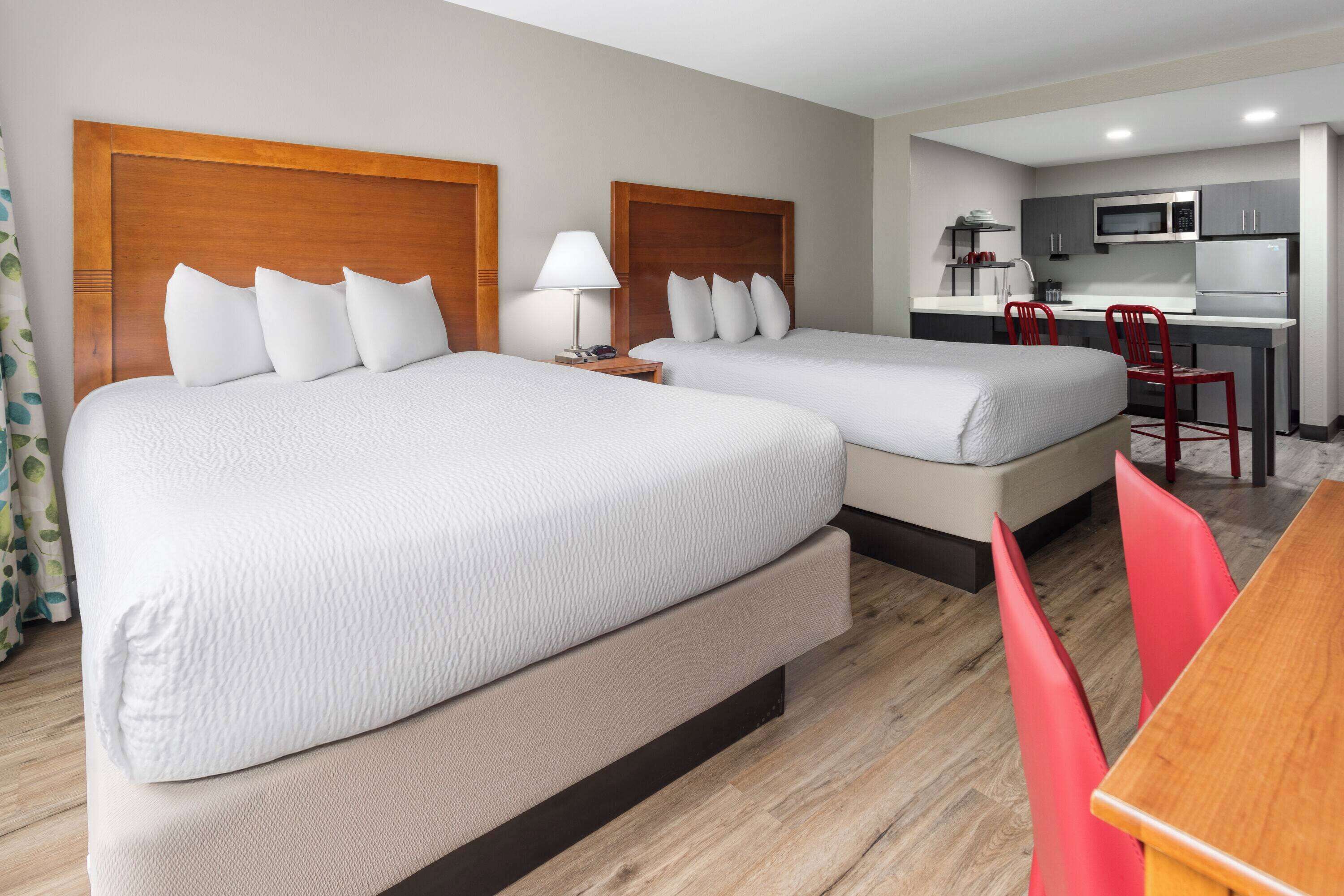 room, 2 queen beds, non smoking (kitchenette) | desk, blackout curtains, iron/ironing board, cots/infant beds