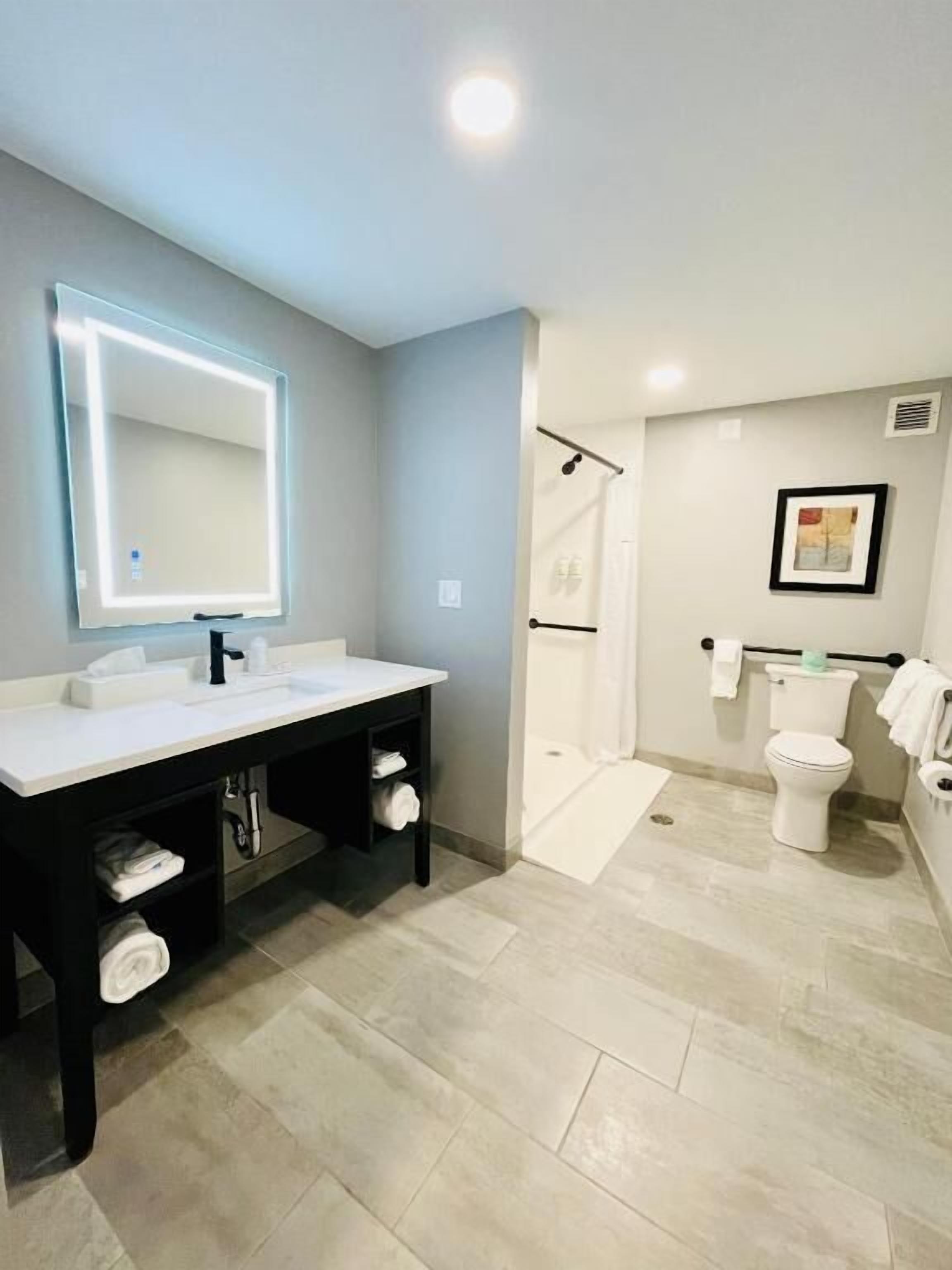 desk, blackout curtains, iron/ironing board, cots/infant beds