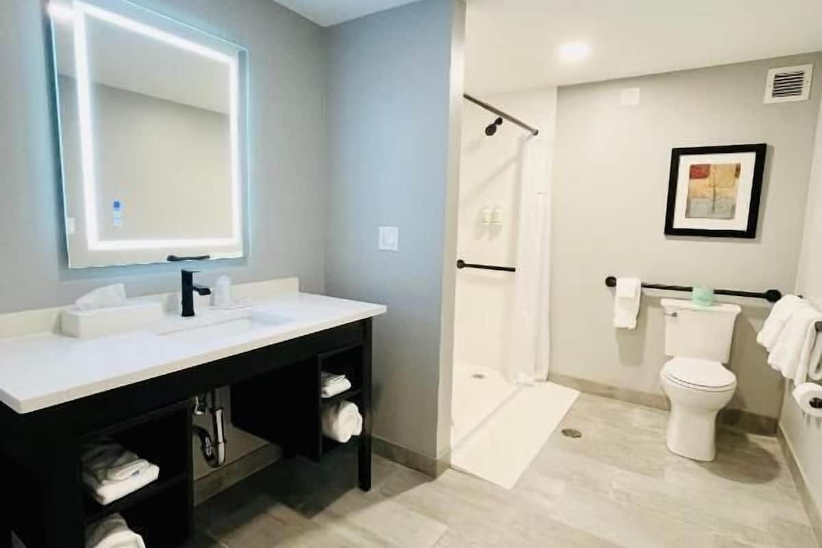 desk, blackout curtains, iron/ironing board, cots/infant beds