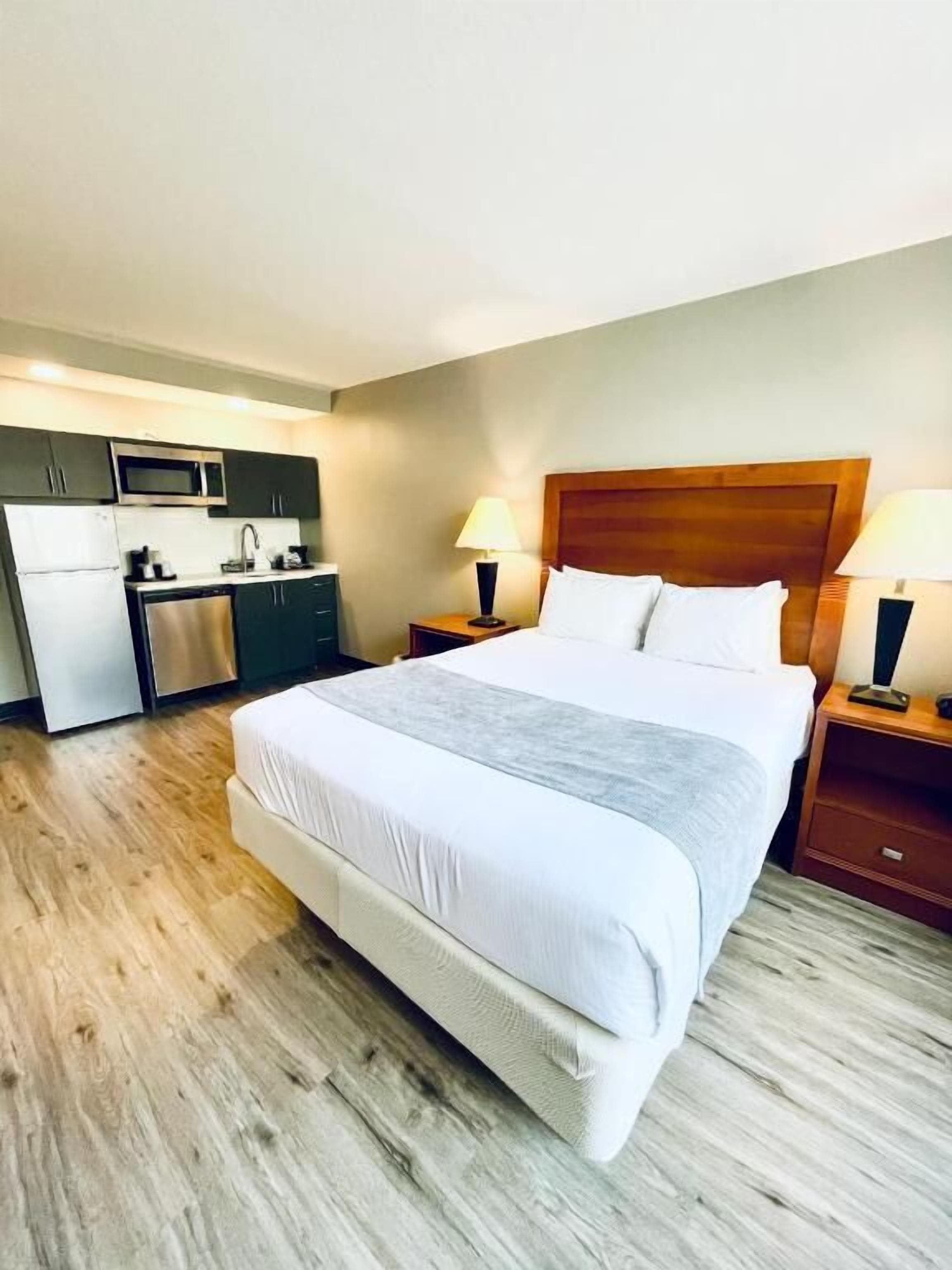 desk, blackout curtains, iron/ironing board, cots/infant beds