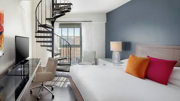 Luxe beddengoed, pillowtop-bedden, een kluis op de kamer, een bureau