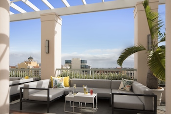 Outdoor pool, open 7:00 AM to 8:00 PM, sun loungers at Hotel Colonnade Coral Gables, Autograph Collection