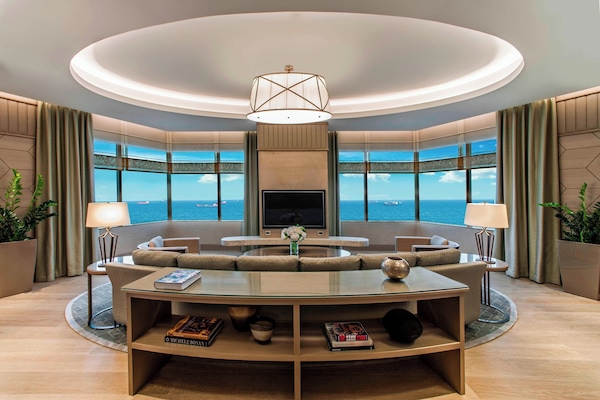 Presidential Suite, 1 King Bed, Sea View | Living room | 49-inch flat-screen TV with cable channels, TV, pay movies