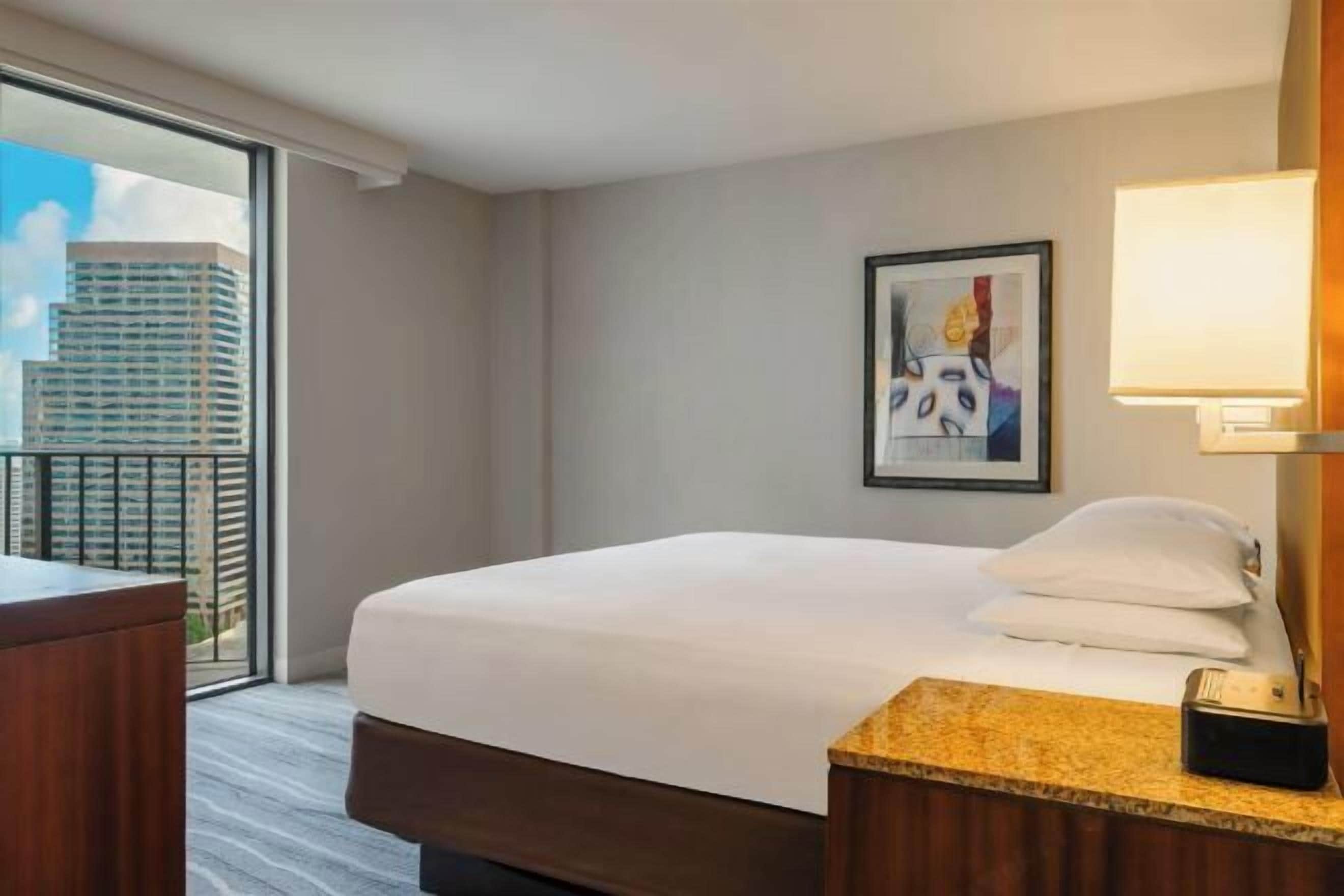 Premium bedding, down comforters, in-room safe, desk