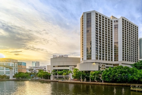Situated by the water, this hotel offers stunning views from its grid of windows.