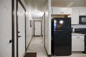 Suite, varias camas, no fumadores (Upgrade) | Ropa de cama de alta calidad, caja fuerte, escritorio y cortinas opacas
