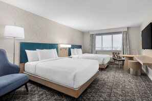 Suite, 2 Queen Beds (Two Room) | Premium bedding, desk, iron/ironing board, free cribs/infant beds
