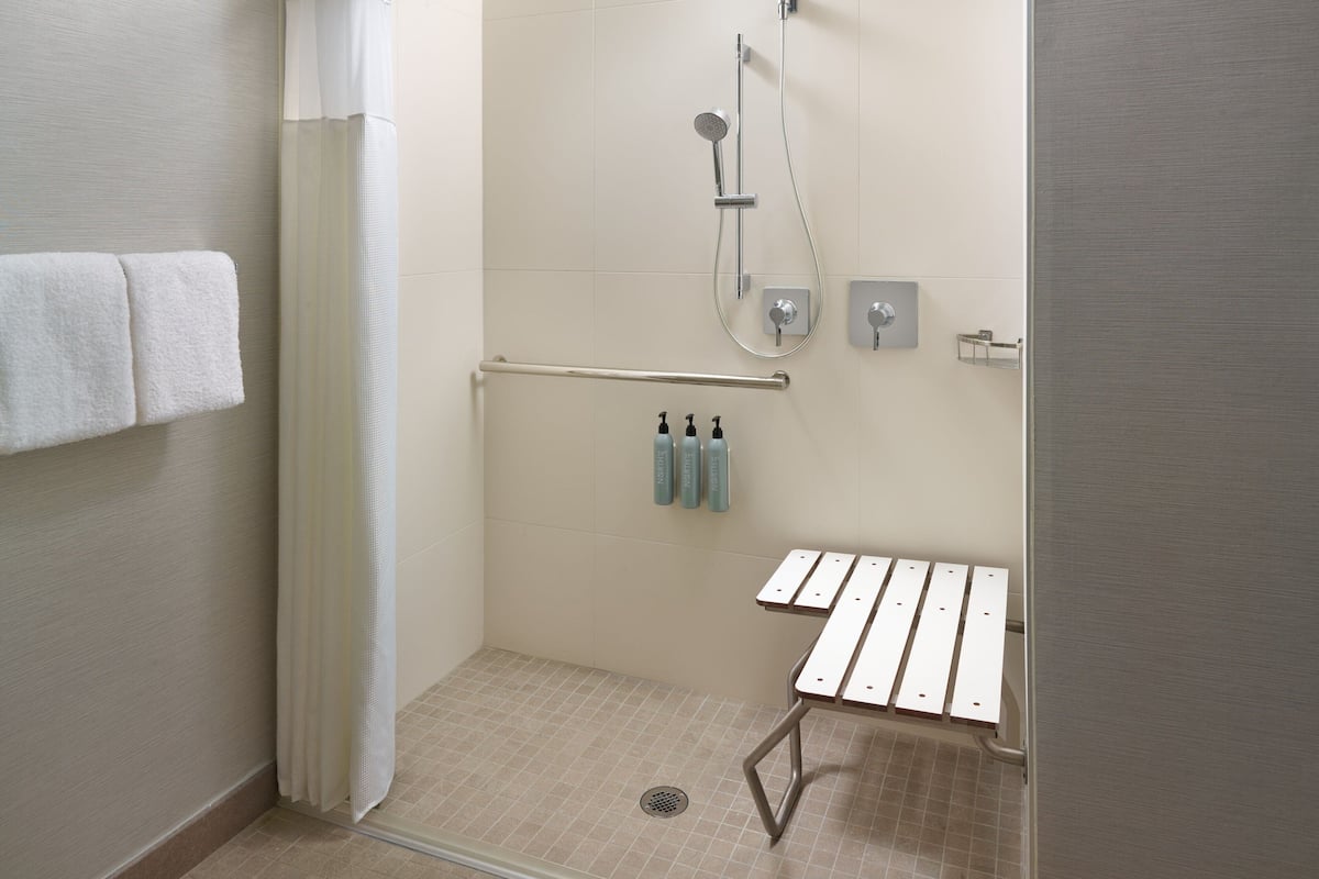 Combined shower/tub, eco-friendly toiletries, hair dryer, towels