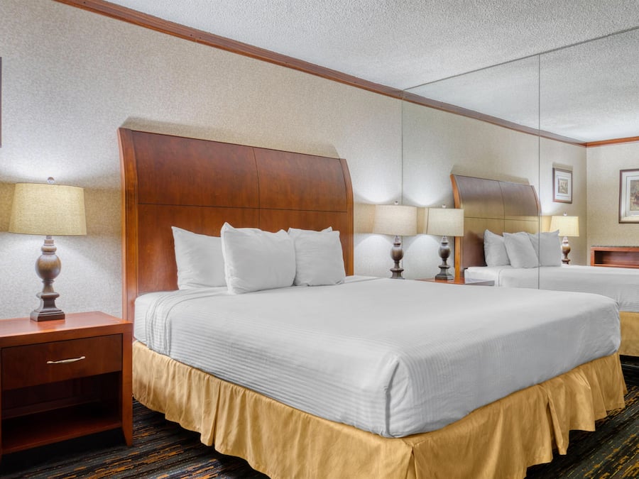 Suite, 1 King Bed, Non Smoking, Refrigerator & Microwave (with Sofabed) | Desk, laptop workspace, blackout curtains, iron/ironing board