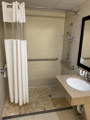 Room, 1 King Bed, Accessible, Non Smoking (Roll-In Shower) | Bathroom | Free toiletries, hair dryer, towels