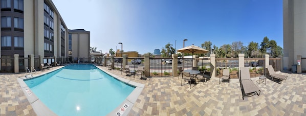 Outdoor pool, pool umbrellas, sun loungers