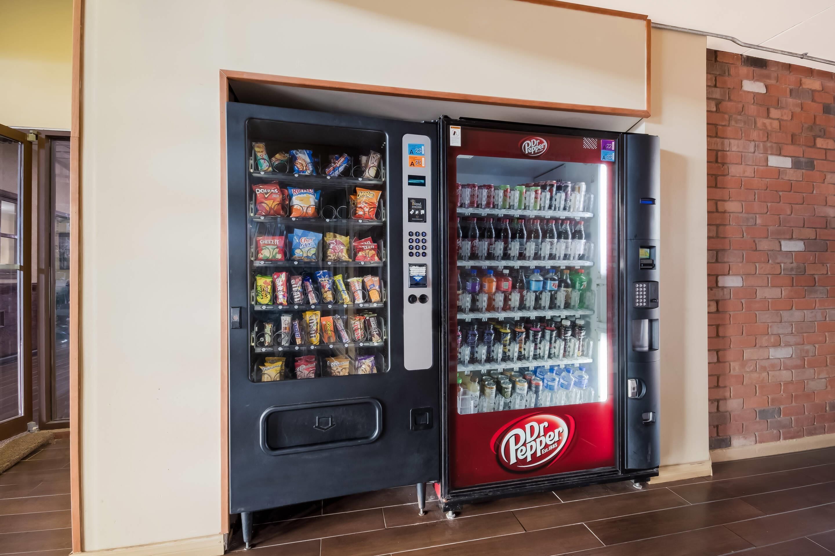 A vending machine with snacks and Dr. Pepper beverages.