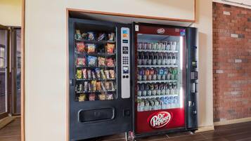 A vending machine with snacks and Dr. Pepper beverages.
