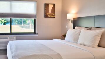 Premium bedding, down comforters, desk, blackout drapes