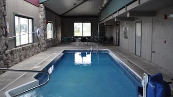 Indoor pool, open 9:00 AM to 11:00 PM, pool loungers