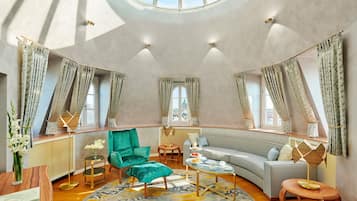 Premium bedding, down comforters, free minibar, in-room safe