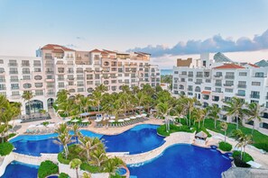 2 outdoor pools, pool umbrellas, pool loungers