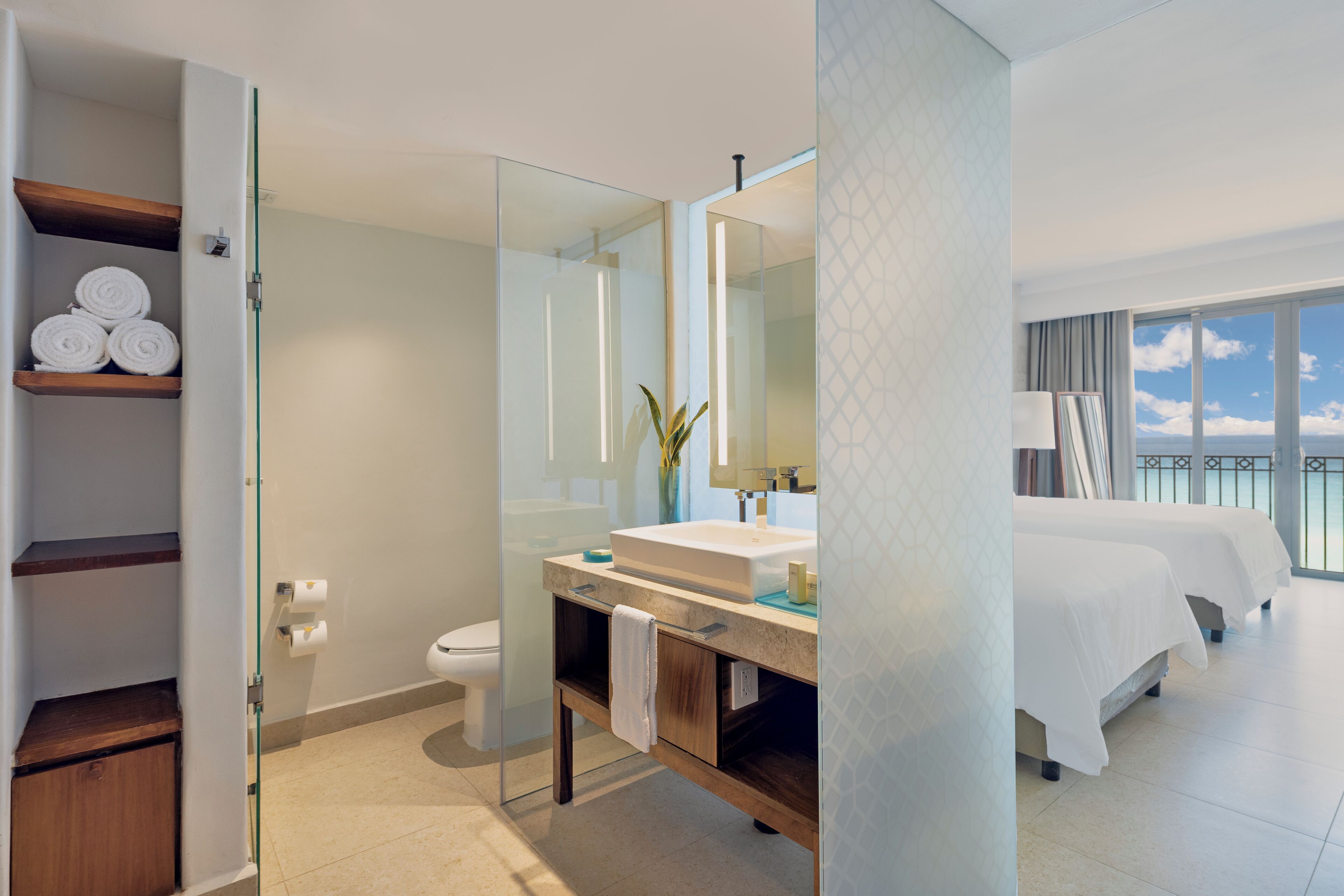 Premium bedding, down comforters, pillowtop beds, minibar