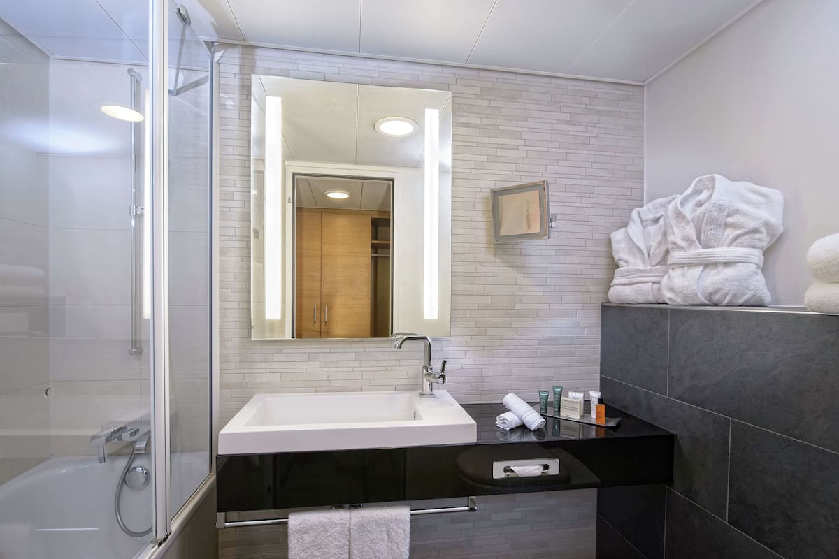 Shower, eco-friendly toiletries, hair dryer, towels