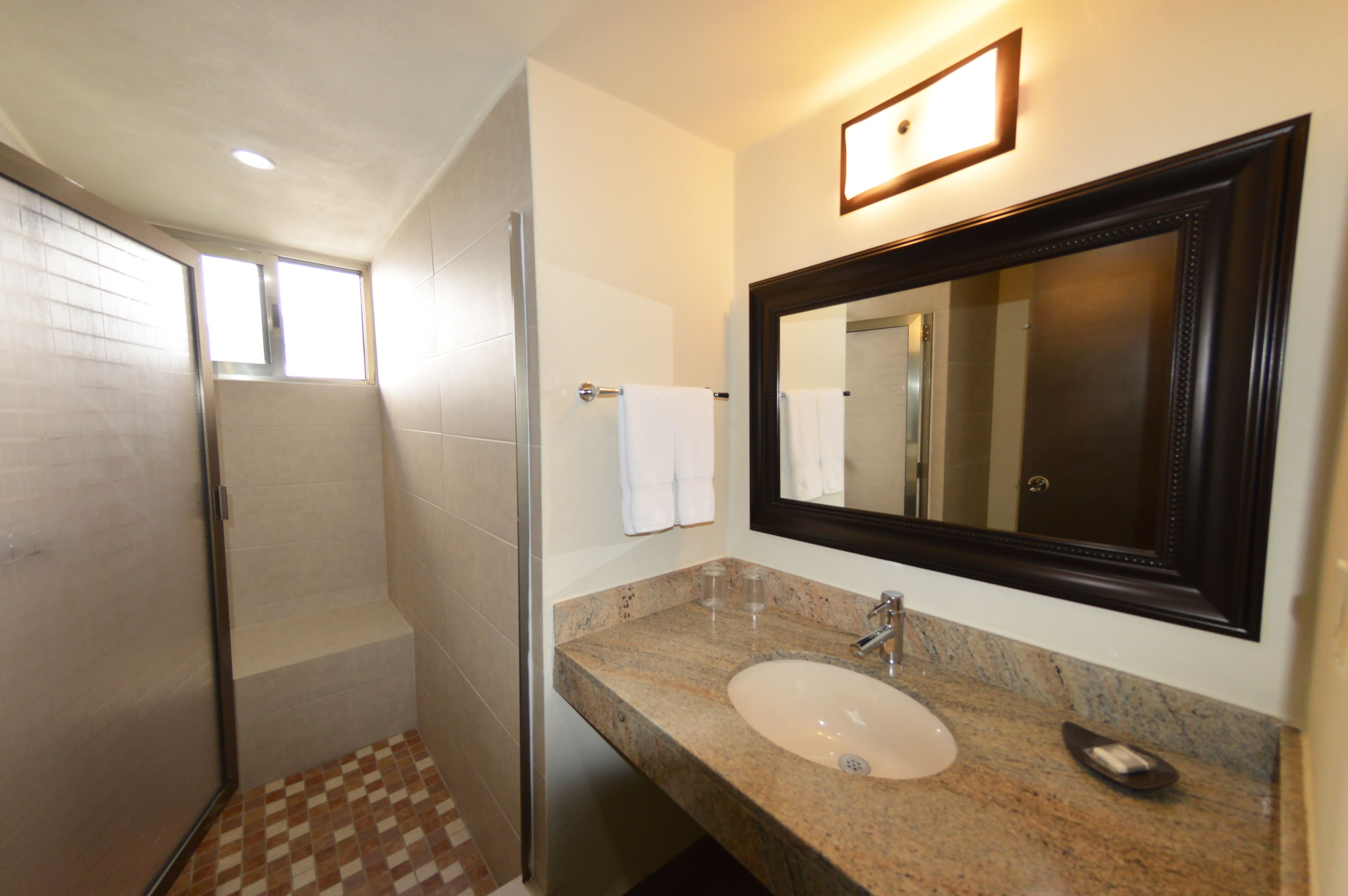 superior suite, 2 bathrooms | bathroom | shower, eco-friendly toiletries, hair dryer, towels