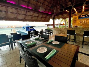 Breakfast, lunch, dinner served; international cuisine, pool views 