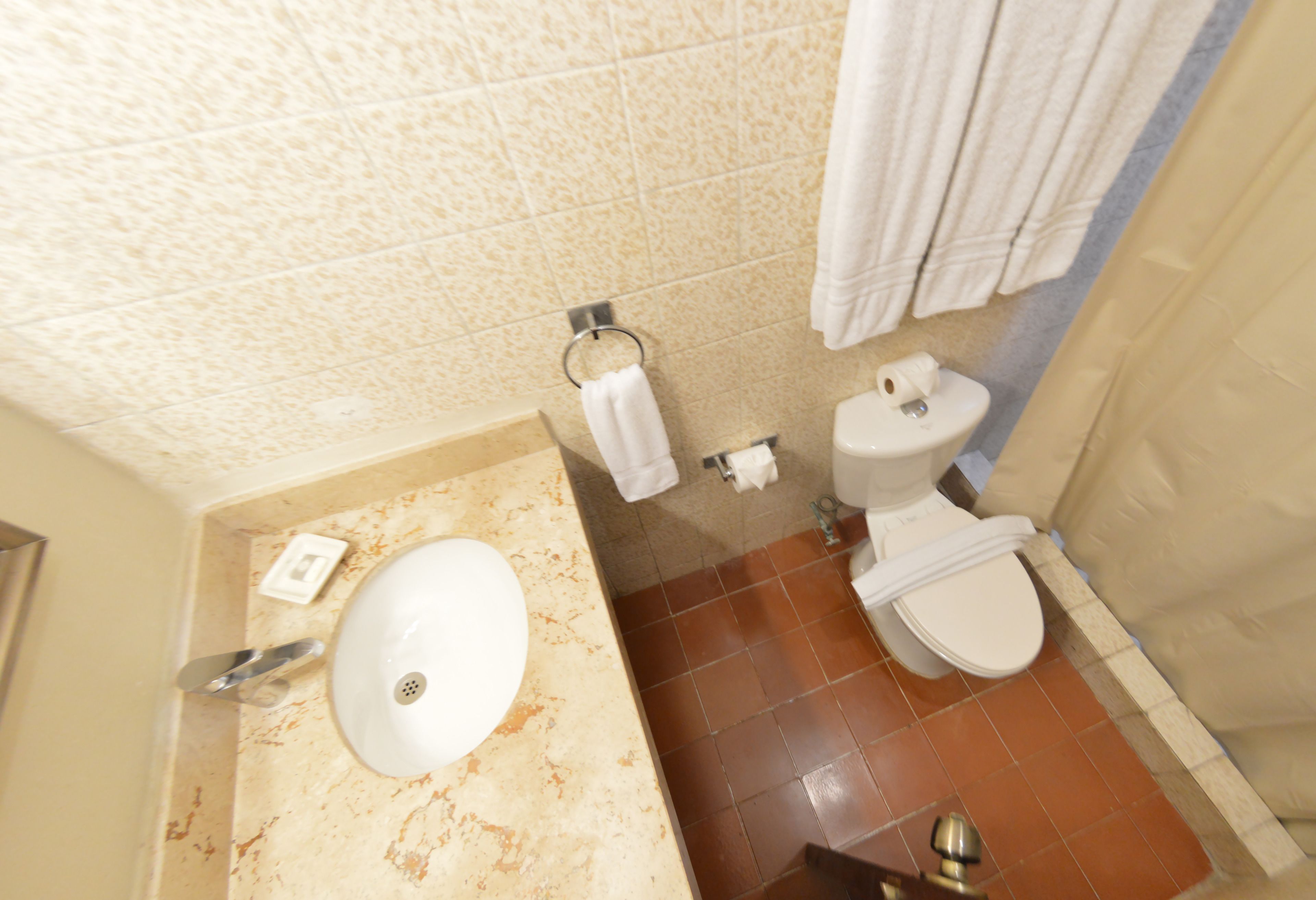 standard double room | bathroom | shower, eco-friendly toiletries, hair dryer, towels