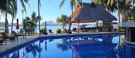 Outdoor pool, open 7:30 AM to 10:00 PM, pool umbrellas, sun loungers