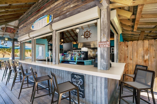 Beach views, serves lunch, dinner, and happy hour