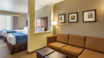 Suite, Multiple Beds, Non Smoking (2 Queen Beds & 2 Person Sofa bed) | Desk, blackout drapes, iron/ironing board, free WiFi