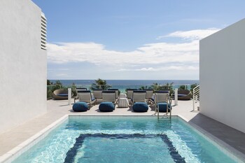 2 outdoor pools, open 7:00 AM to 7:00 PM, sun loungers at The Gabriel Miami South Beach, Curio Collection by Hilton