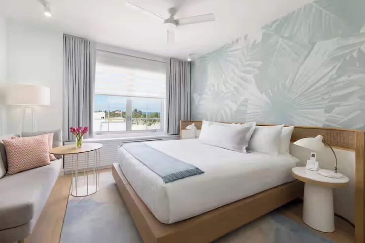 Premium bedding, pillow-top beds, minibar, in-room safe