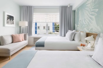 Deluxe Room, 2 Queen Beds, Non Smoking | Living area | 50-inch LCD TV with cable channels, TV at The Gabriel Miami South Beach, Curio Collection by Hilton