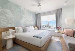 Quarto standard, 1 cama King, vista parcial para o oceano | 1 quarto, roupas de cama premium, camas com colchões pillow-top
