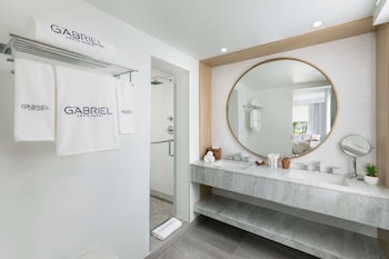 Bathroom shower at The Gabriel Miami South Beach, Curio Collection by Hilton