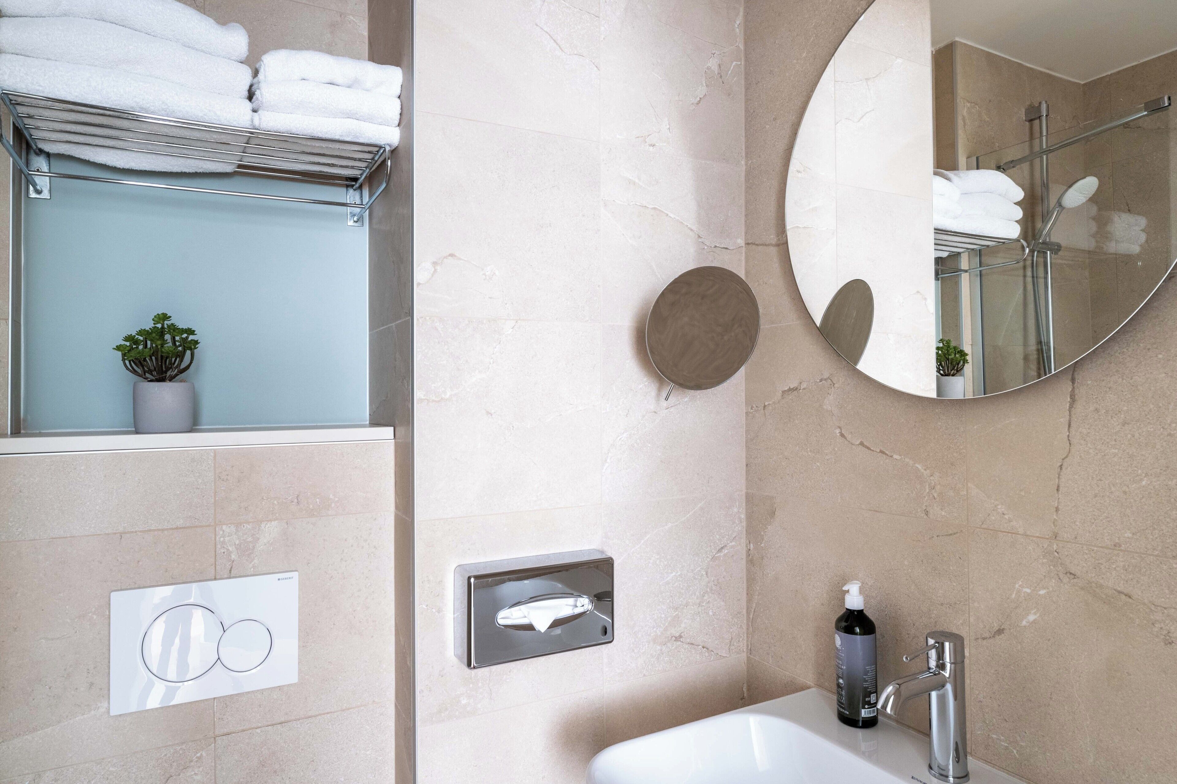 standard double room - complimentary soft minibar, courtesy tray, chromecast - snacks, digital press | bathroom | shower, eco-friendly toiletries, hair dryer, towels