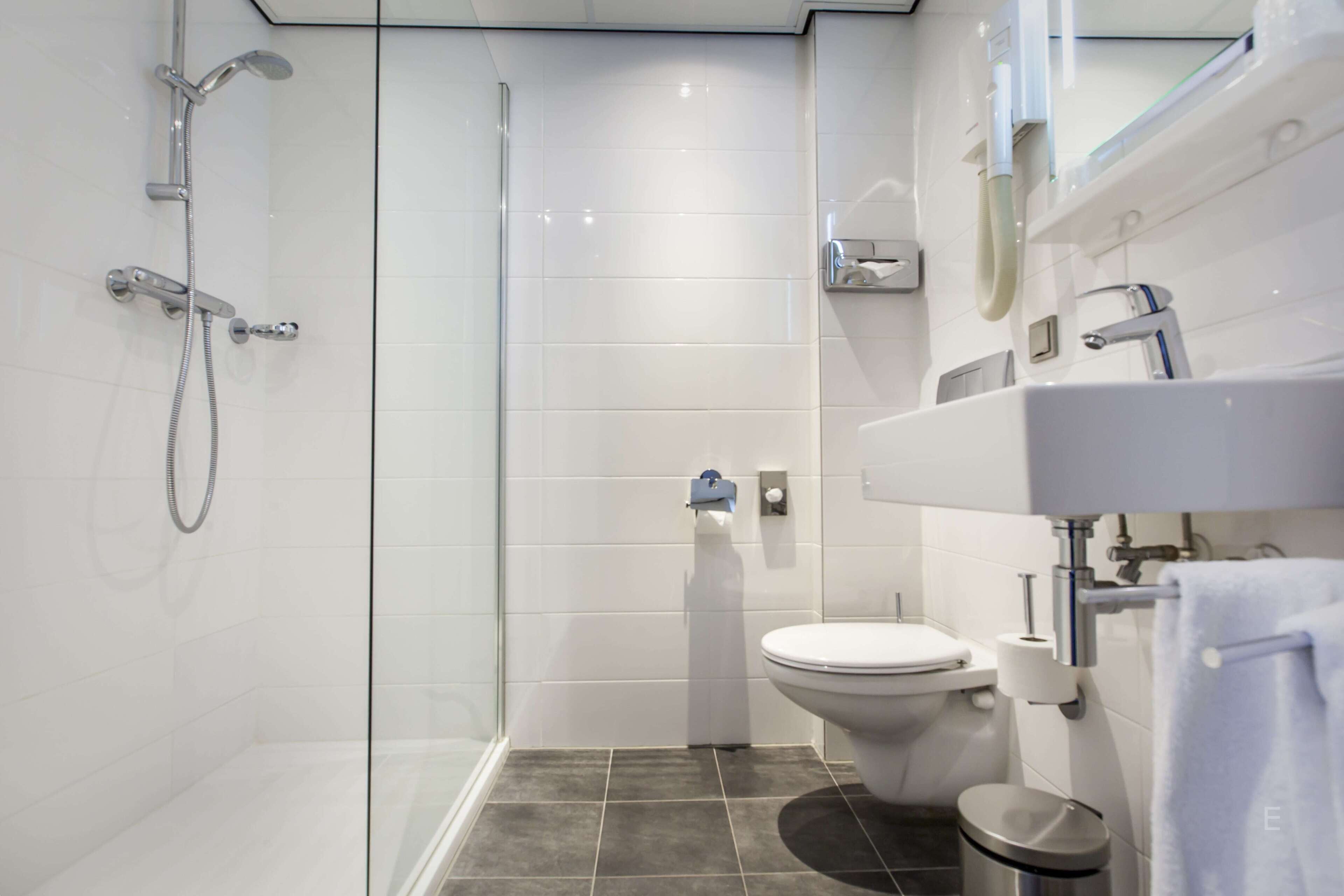 eco-friendly toiletries, hair dryer, towels, soap