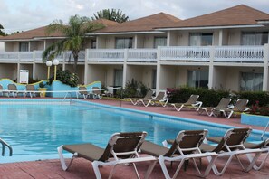 Indoor pool, outdoor pool, pool umbrellas