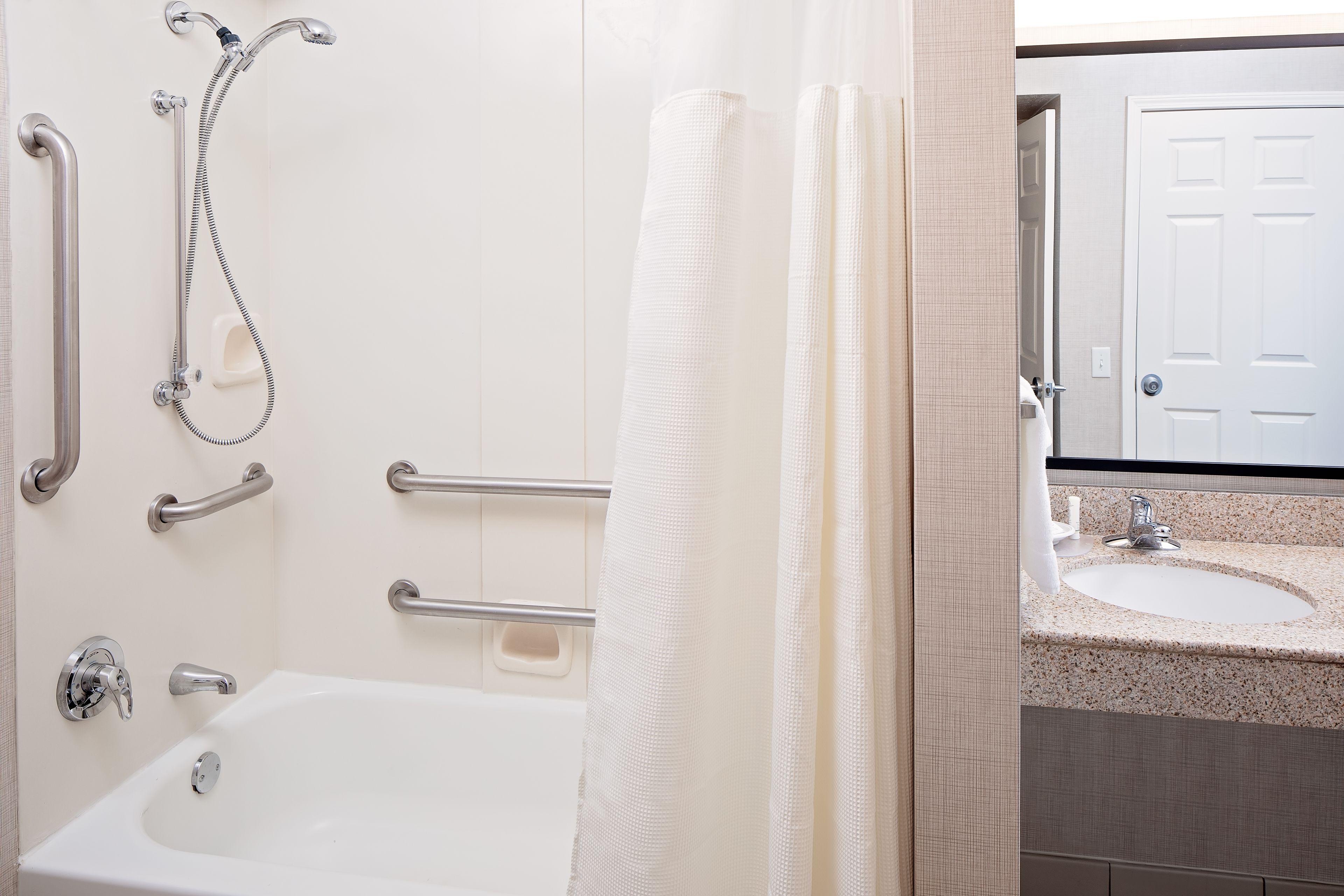 combined shower/bathtub, eco-friendly toiletries, hair dryer, towels