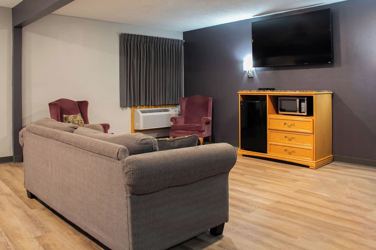 suite, multiple beds (double king suite) | living area | 42-inch flat-screen tv with cable channels, tv