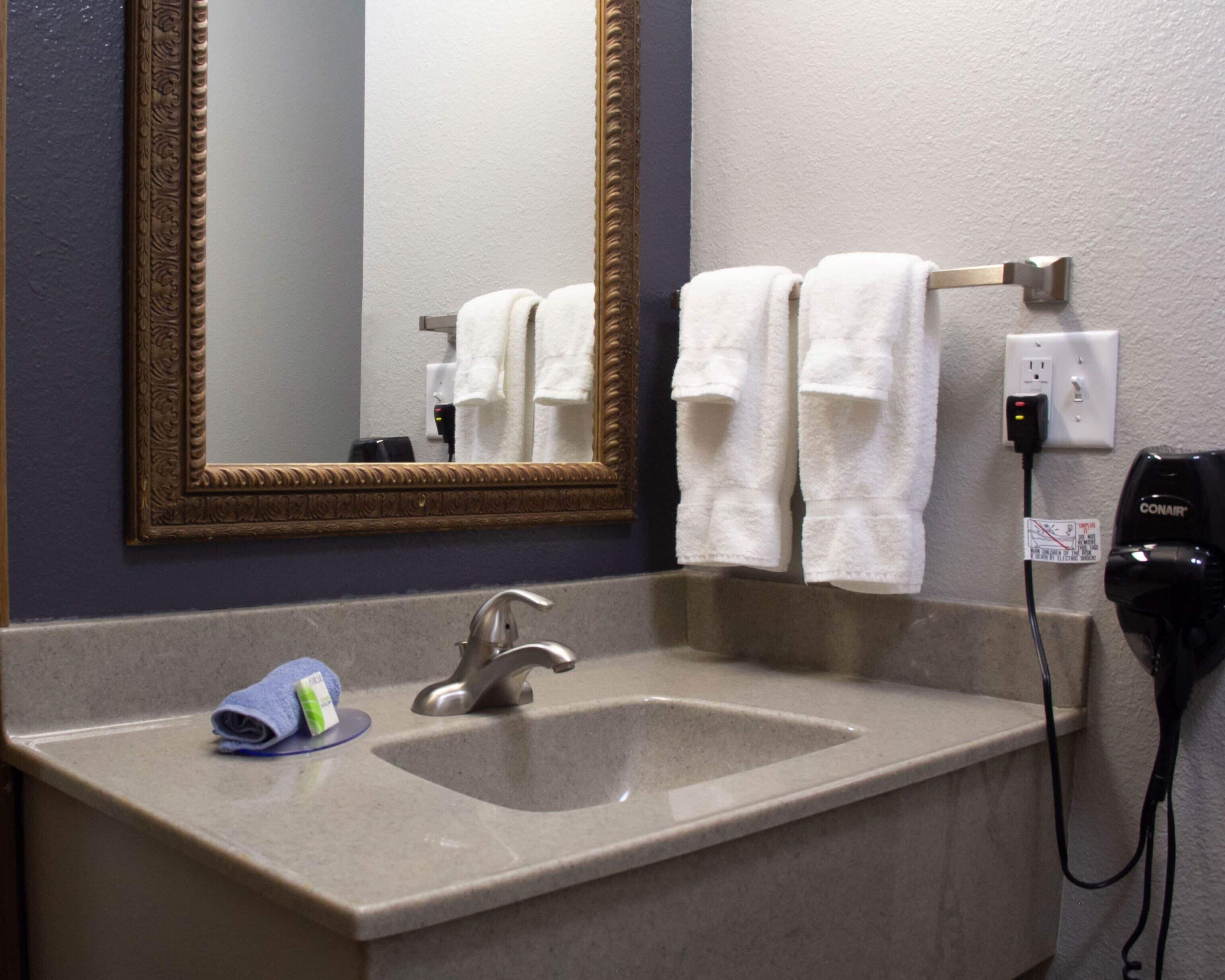 combined shower/bathtub, free toiletries, hair dryer, towels