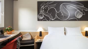Premium bedding, desk, blackout drapes, soundproofing