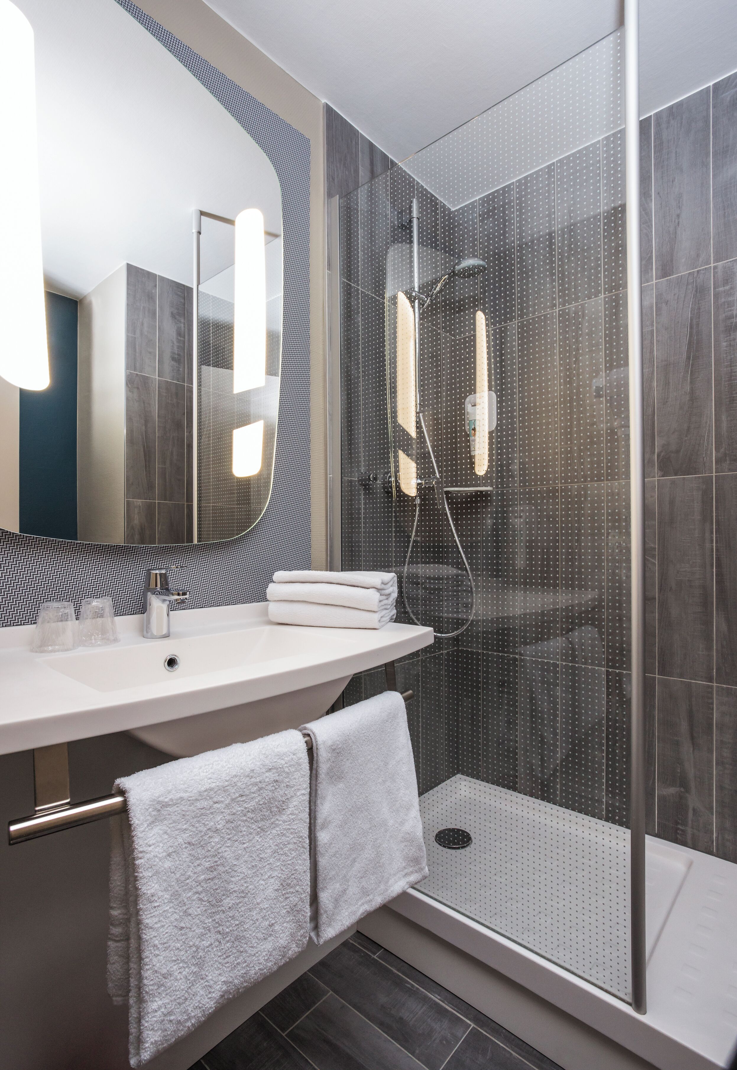 Shower, eco-friendly toiletries, hair dryer, towels